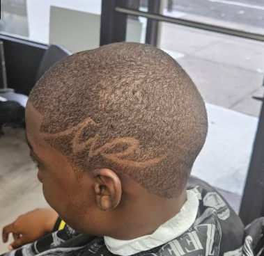 Freestyle hair design carved into a low cut