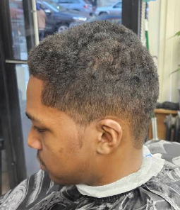 Textured taper cut with natural curl left on top